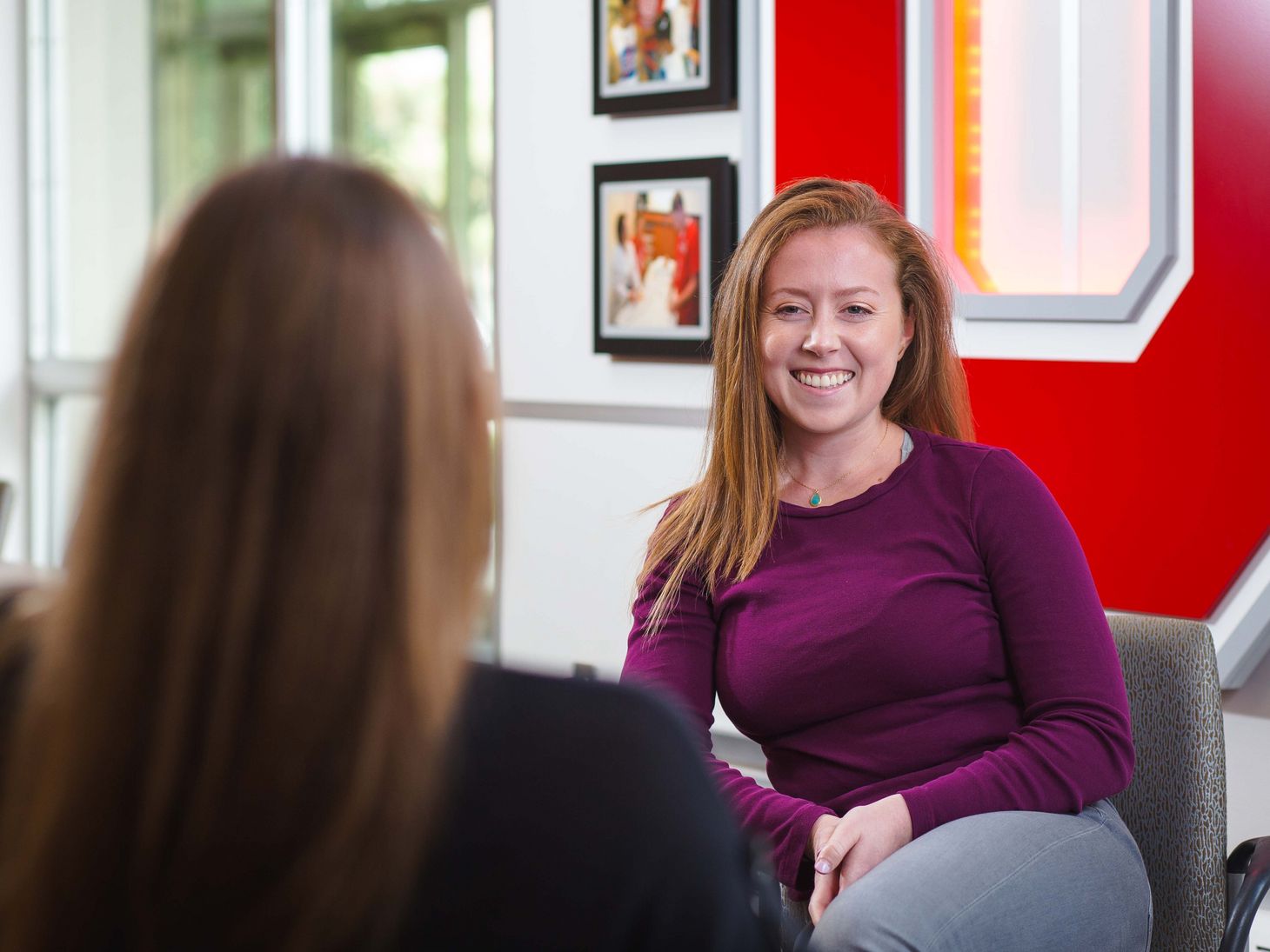 Student smiling and talking